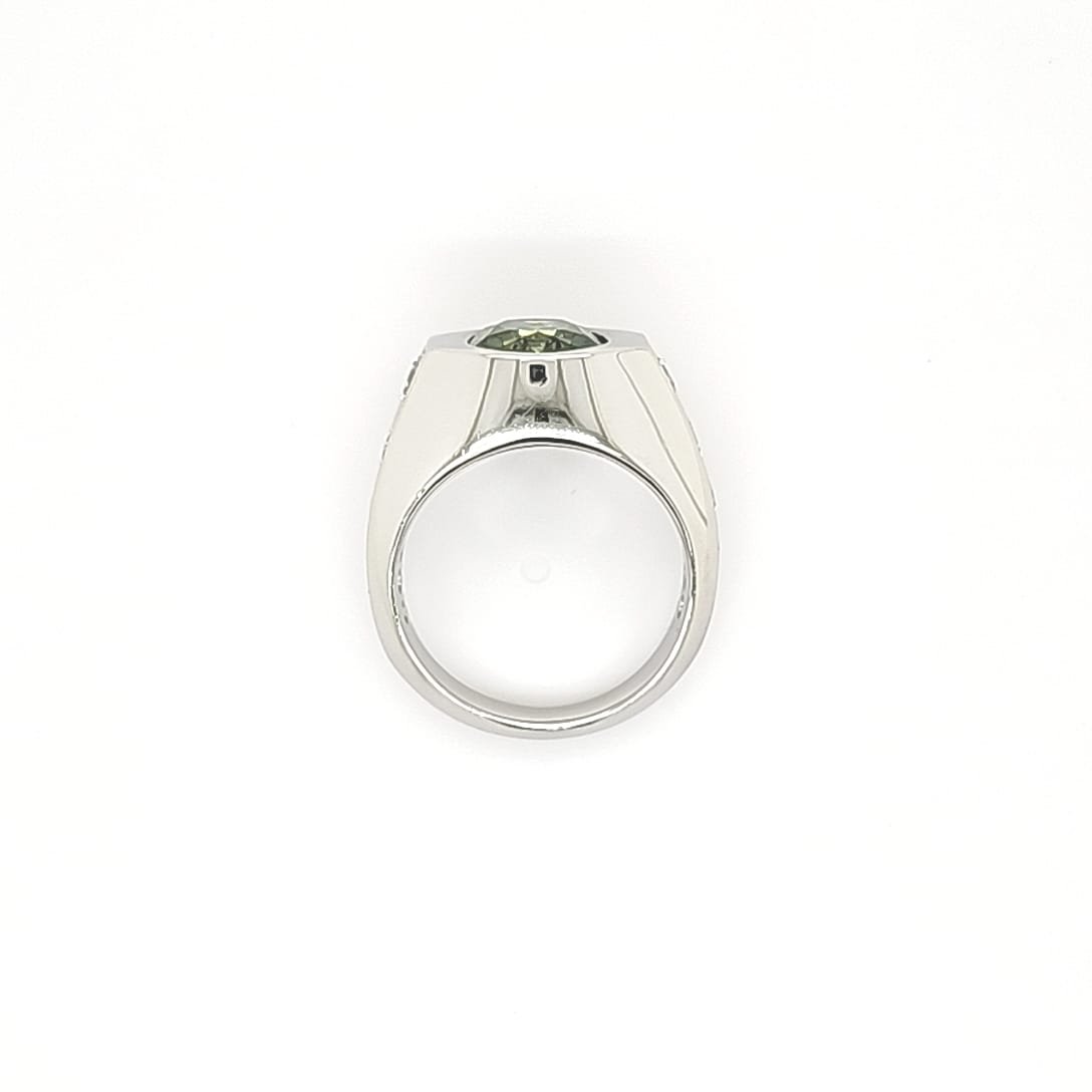 This ring is not merely jewelry; it is a wearable work of art, blending meticulous craftsmanship with rare natural beauty